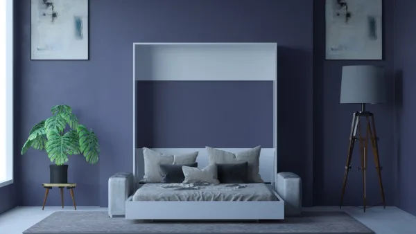 white wall bed with a sofa, featuring a sleek design and comfortable cushions.