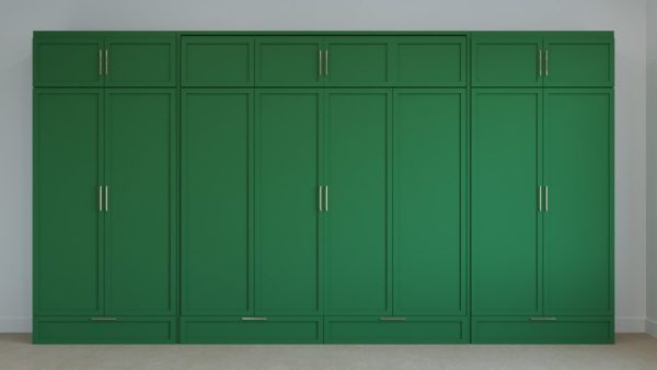 Closed green wall bed designed to look like a wardrobe, providing a sleek and modern storage