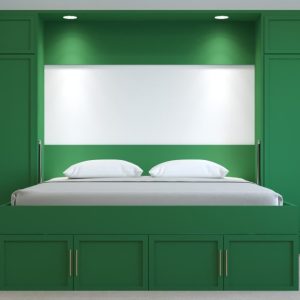 space-saving green Murphy bed disguised as a cabinet in a modern room. Wall bed solution for small spaces.