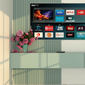 mint green wall-mounted tv unit with vertical panel design and pink flowers in a vase