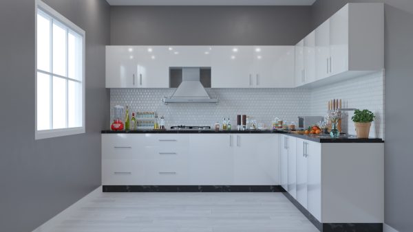 L shaped modular kitchen with white cabinets and black countertops featuring modern storage solutions